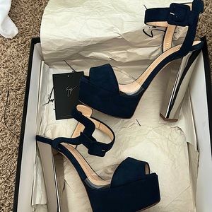 Selling - worn about 3 times total VERY on trend chrome heel